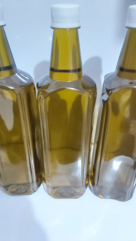 روغن زیتون دارویی بهترین روغن زیتون دنیا بدون جداسازی املاح و گوشت زیتون یک لیتری