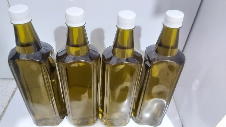 روغن زیتون دارویی بهترین روغن زیتون دنیا بدون جداسازی املاح و گوشت زیتون یک لیتری